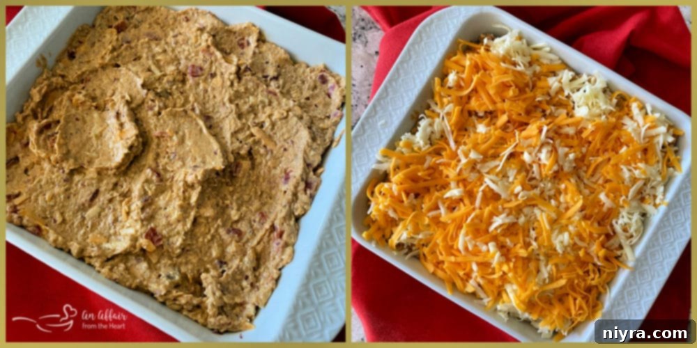 The five bean dip mixture spread evenly into an 8x8 inch baking dish, topped with the remaining shredded cheese, ready for baking.