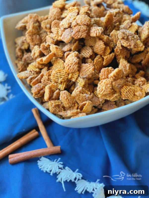Caramel Churro Chex Mix in a glass dish