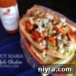 Overhead of saucy mama buffalo chicken meatball sub