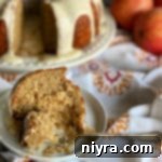 Caramel Apple Tea Cake sliced with a bite on fork