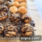 Close up of Coconut Macaroons on a cooling rack