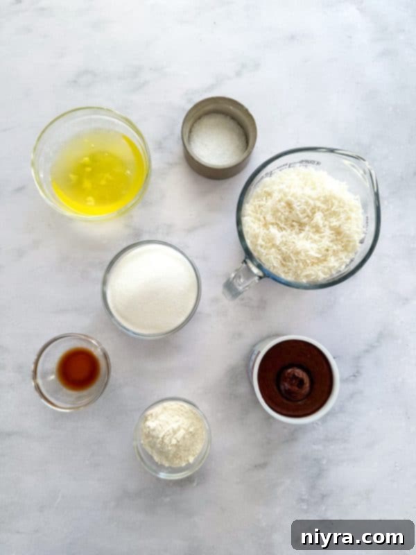 A freshly baked coconut macaroon with a rich chocolate drizzle