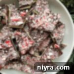 Serving bowl of peppermint bark, a festive holiday treat.