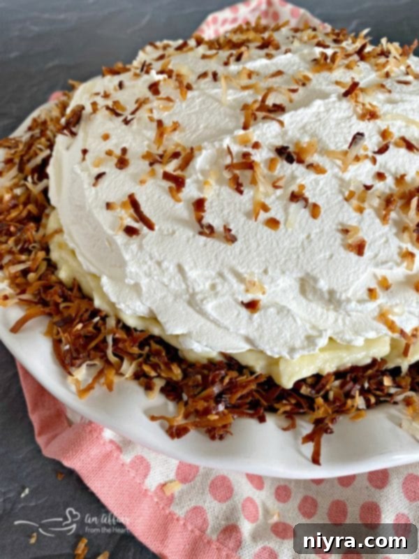 Close-up of a finished Coconut Banana Cream Pie slice