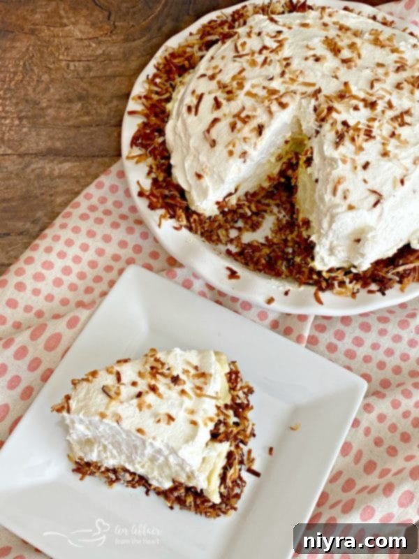 Top view of a beautifully decorated Coconut Banana Cream Pie