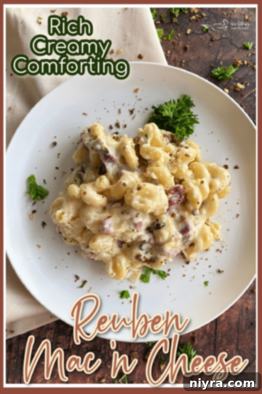 A serving of Reuben Mac 'n Cheese on a fork