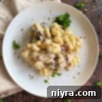 Overhead of Reuben Mac n Cheese on white plate