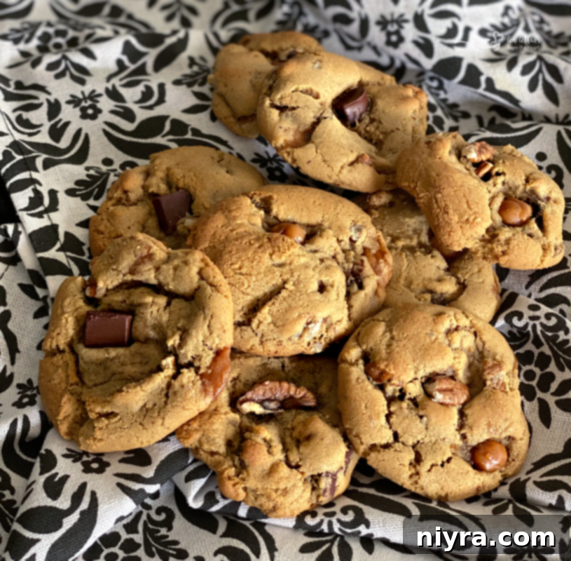 Close-up of a stack of Turtle Cookies, showcasing their rich texture and delicious toppings.