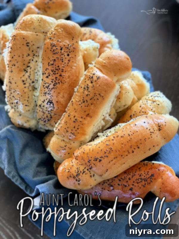 Beautifully arranged homemade poppyseed rolls on a platter