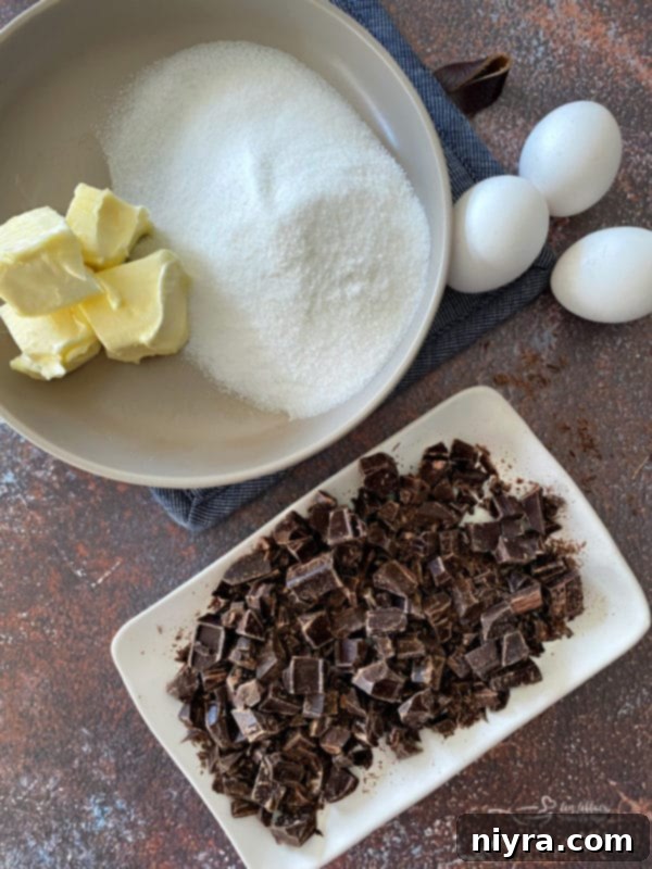 Cookie Dough Brownie Dream 8 High-quality dark chocolate chunks in a small bowl, ready for melting
