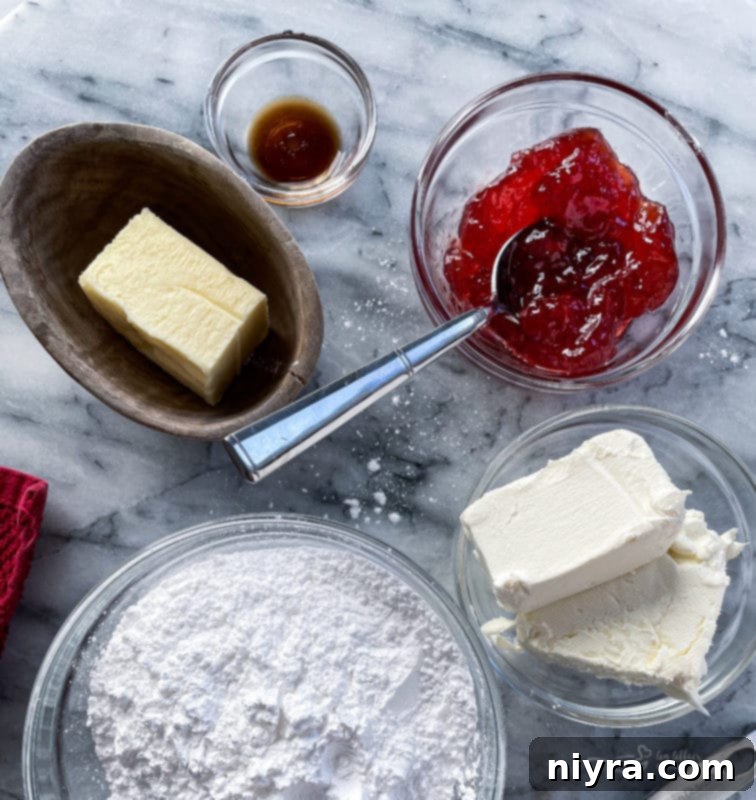 Ingredients for Strawberry Cream Cheese Filling including unsalted butter, cream cheese, vanilla extract, strawberry jam, and powdered sugar