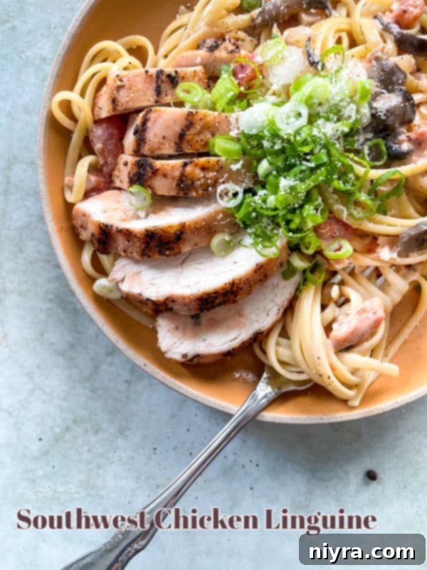 Hero shot of Southwest Chicken Linguine in a bowl with green onions