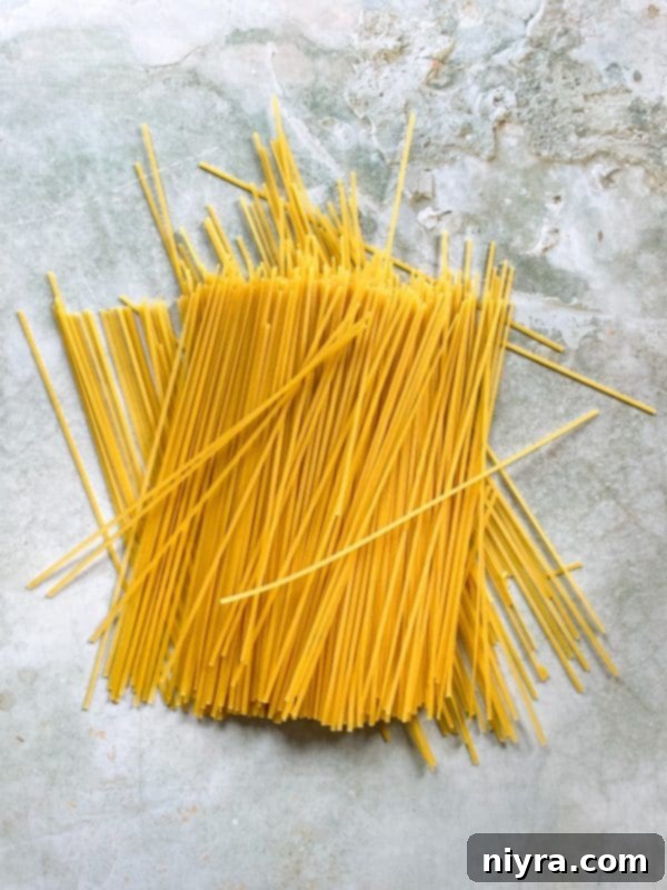 Heavy cream and Parmesan cheese, essential for creamy Southwest Chicken Linguine