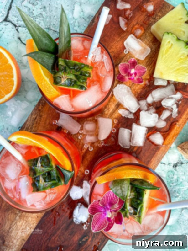 An elegant Tropical Sparkling Cocktail in a crystal glass, ready to be served