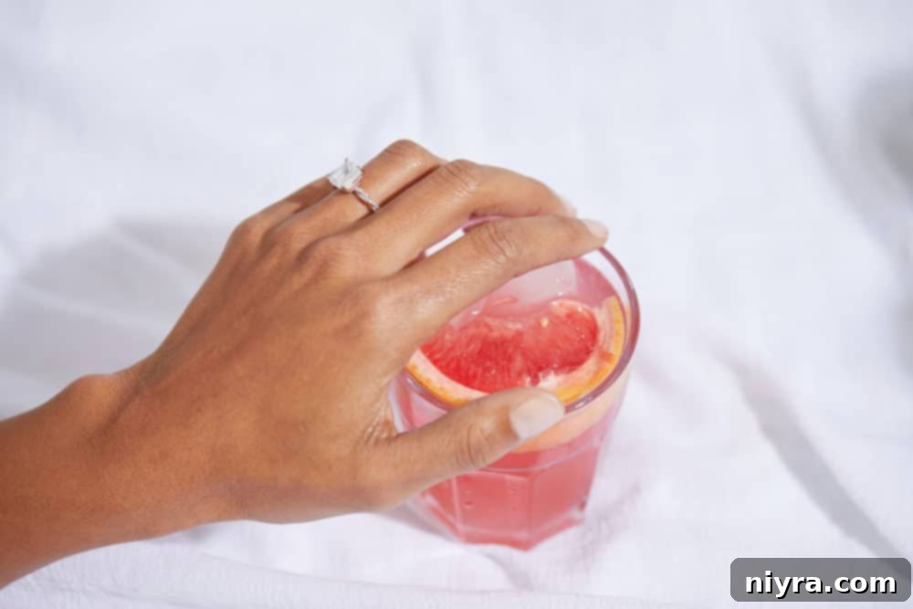 Two hands displaying a stunning lab-grown diamond ring, emphasizing its brilliant sparkle and clarity