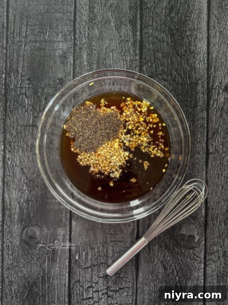 Close-up of a steak scored in a grid pattern.