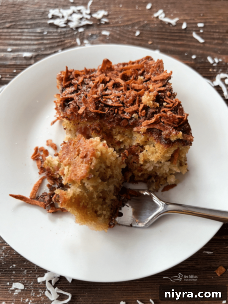Sweet and Tart Rhubarb Bliss 2 A slice of freshly baked rhubarb cake with a crunchy topping.