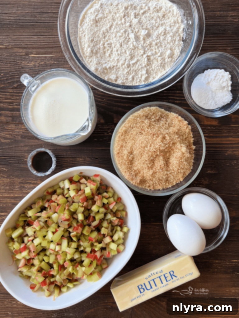 Sweet and Tart Rhubarb Bliss 5 A whole fresh rhubarb stalk on a wooden cutting board.