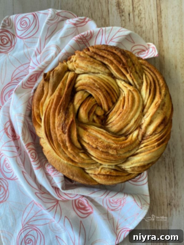 Bloomed Russian Delight 14 The golden brown Russian rose bread, fresh out of the oven, still in the springform pan.