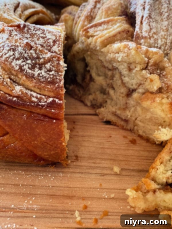 Bloomed Russian Delight 15 A freshly baked Russian rose bread, cooled and ready to be sliced, showcasing its perfect form.