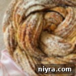 Bloomed Russian Delight 25 Top view of Russian rose bread with powdered sugar