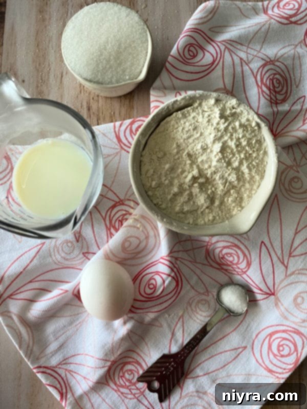 Bloomed Russian Delight 4 A selection of fresh, high-quality ingredients laid out on a wooden surface, ready for making Russian rose bread.