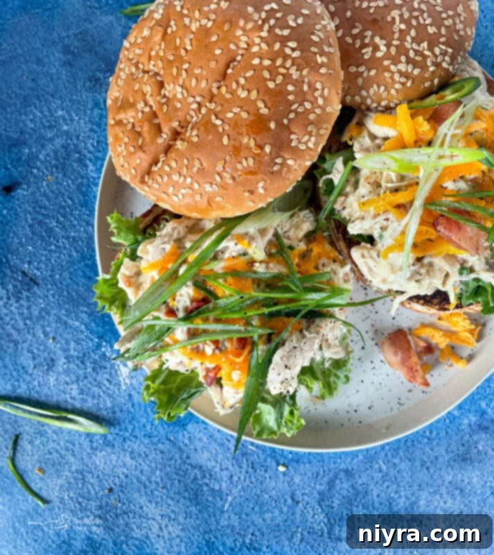 Top view of Instant Pot crack chicken with lettuce and buns