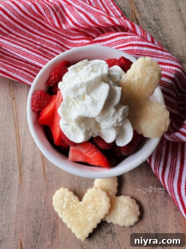 Deconstructed Berry Pies in clear glass bowls, side view.
