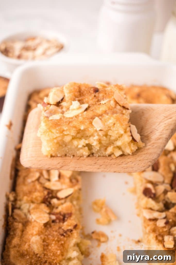 Dutch Almond Letter Bars 4 Three individual Dutch Letter Bars, each perfectly baked with a golden crust and visible almond filling, presented beautifully.