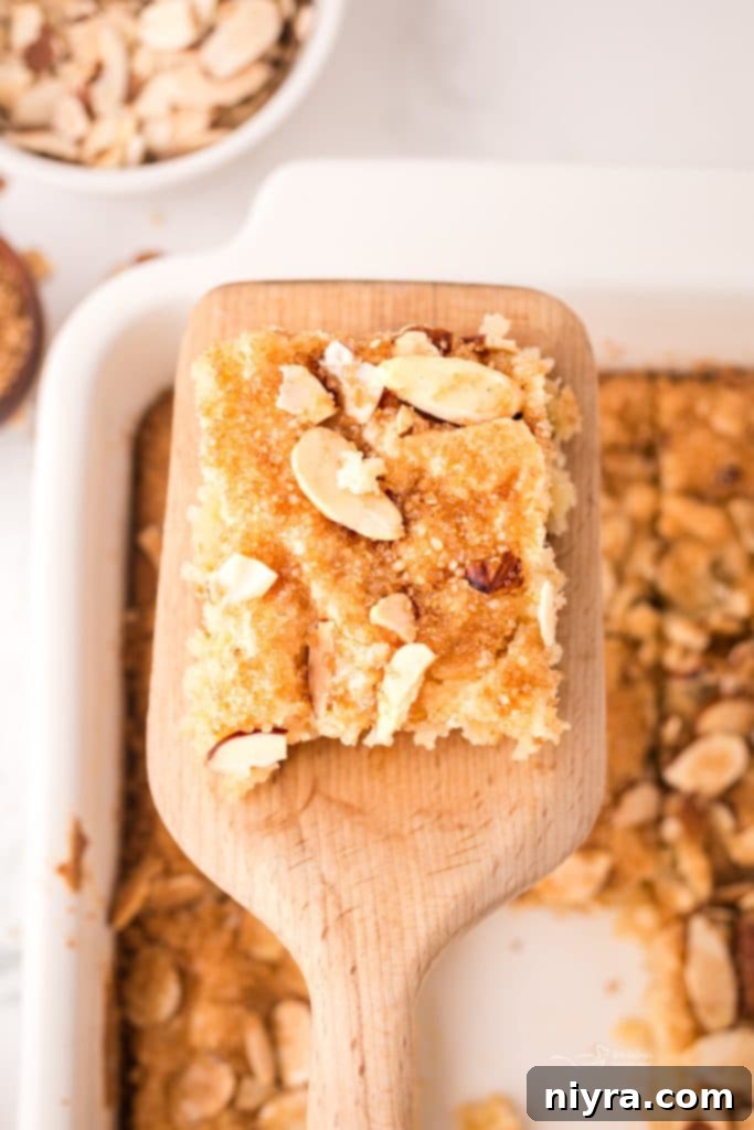 Dutch Almond Letter Bars 7 A spread of ingredients for Dutch Letter Bars, including butter, sugar, eggs, almond paste, flour, and almond extract, ready for baking.