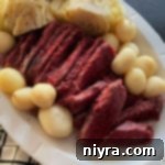 Corned Beef & Cabbage Dinner in a white serving dish