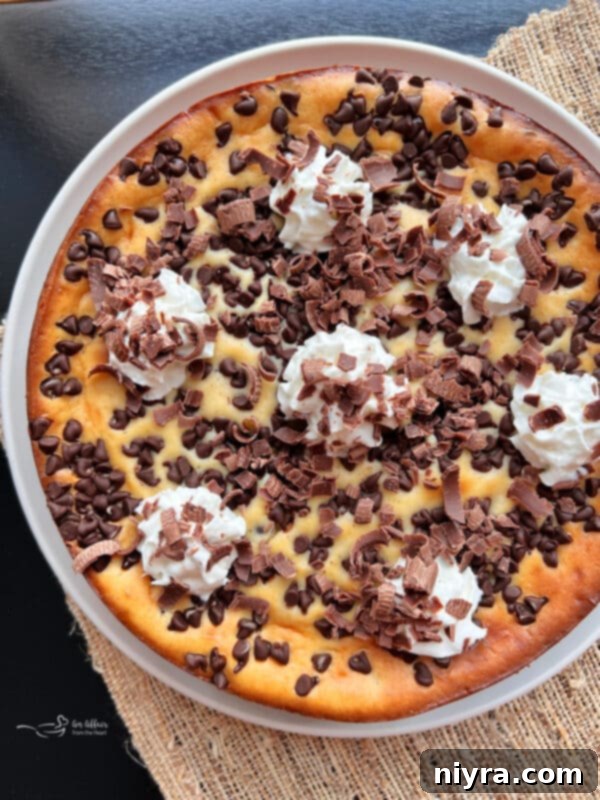 Chilled Irish Cream Cheesecake, with the springform pan removed, showing a smooth, firm surface