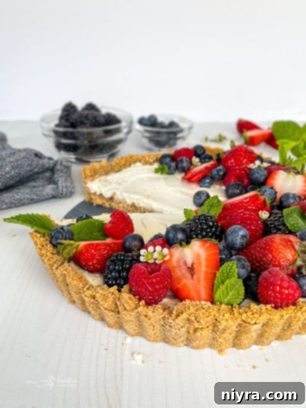 Effortless & Elegant No-Bake Fruit Tart 4 Front view of no bake fruit tart with berries