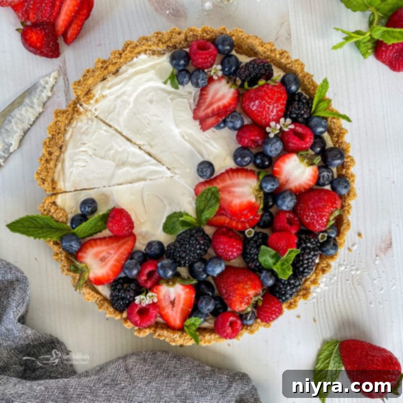 Effortless & Elegant No-Bake Fruit Tart 9 one whole tart with fresh fruit and mint