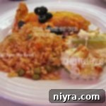 Classic Bean, Cheese and Onion Enchiladas 2 White plate of Mexican food with text "Bean, cheese and onion enchiladas, chili rellenos and an affair from the heart"