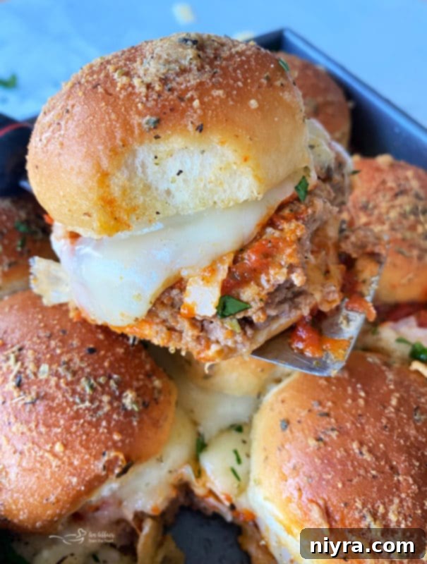 Delicious Italian Meatloaf Sliders with melted cheese and marinara