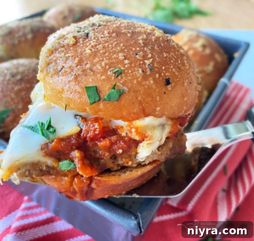Baked Italian Meatloaf Sliders fresh from the oven, bubbly and golden
