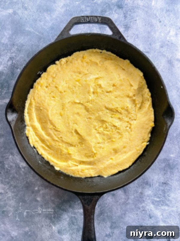 Easy Skillet Tamale Pie Video Tutorial 8 baked golden brown cornbread in a cast iron skillet
