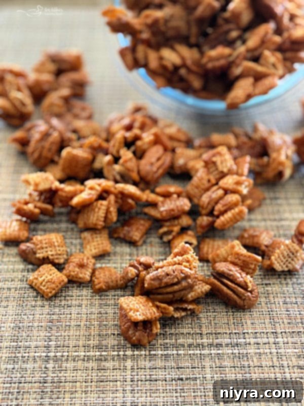 Front view of finished caramel pecan clusters arranged on a surface, ready to be served and enjoyed.