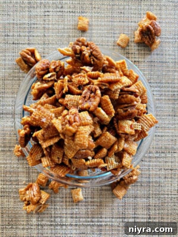 A bowl brimming with delicious caramel pecan clusters, ready for sharing at a gathering.