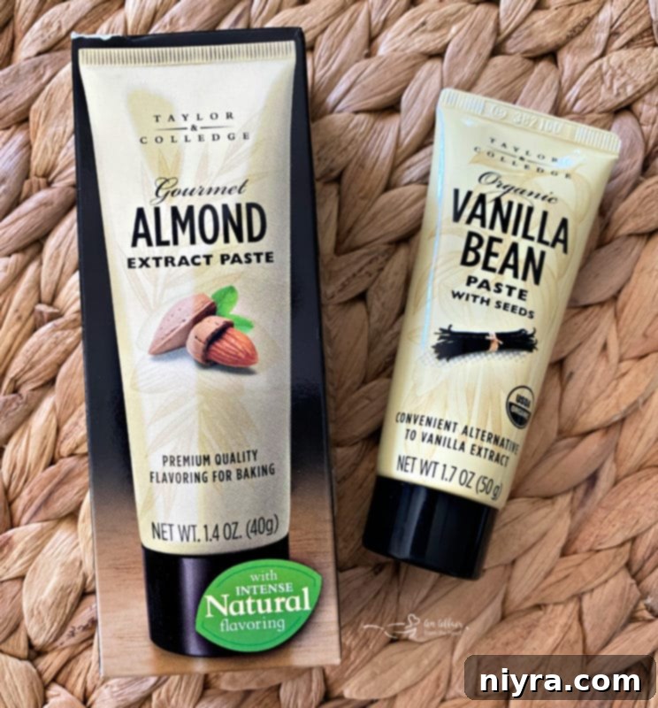 A slender tube of gourmet vanilla bean paste, hinting at its concentrated flavor, resting on a textured woven surface, ready to be incorporated into delicious baked goods.