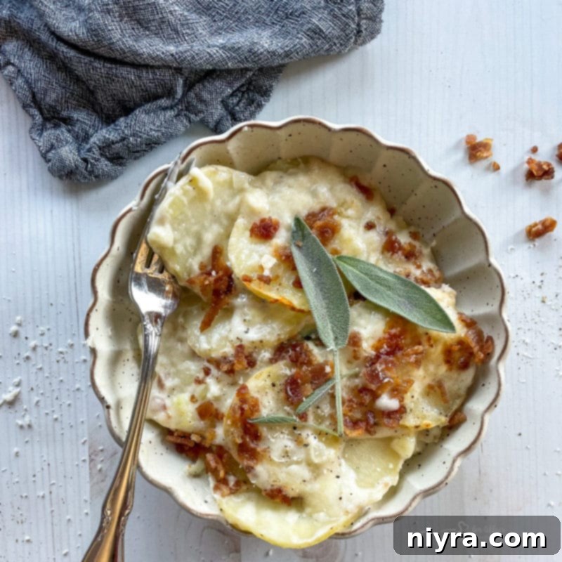 Golden-Crusted Creamy Potatoes 7 one bowl of potatoes au gratin topped with sage and bacon