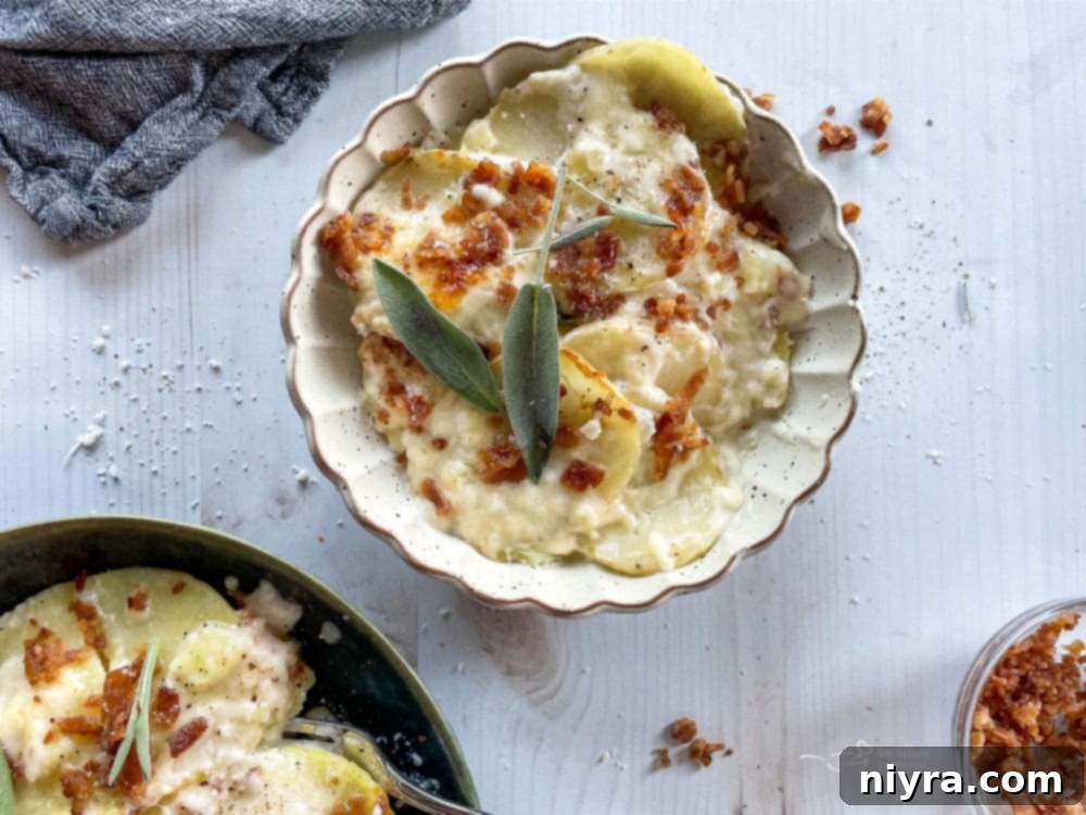 Golden-Crusted Creamy Potatoes 3 two bowls of the best potatoes au gratin recipe from scratch topped with sage and bacon