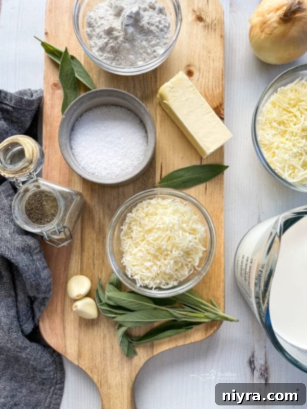 Easy Potatoes Au Gratin cheese, flour, salt, sage, garlic, pepper, butter on cutting board