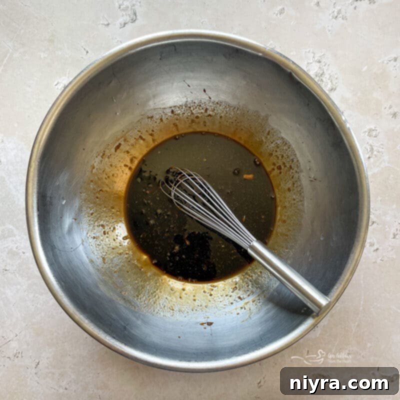 Chicken legs in a bowl, ready for marinade