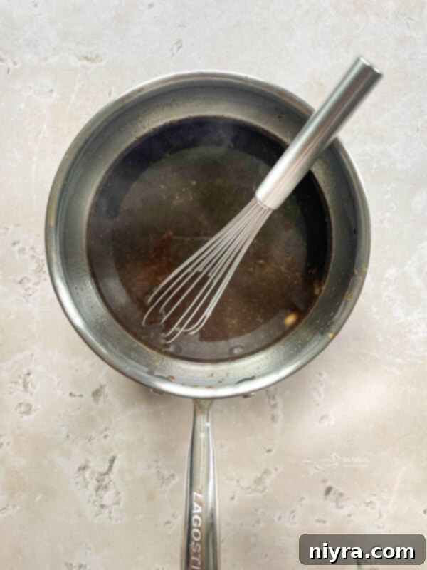 Chicken drumsticks on a hot grill with grill marks