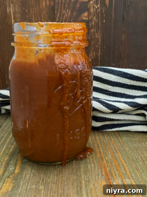How to Make Red Enchilada Sauce - homemade red sauce in a jar
