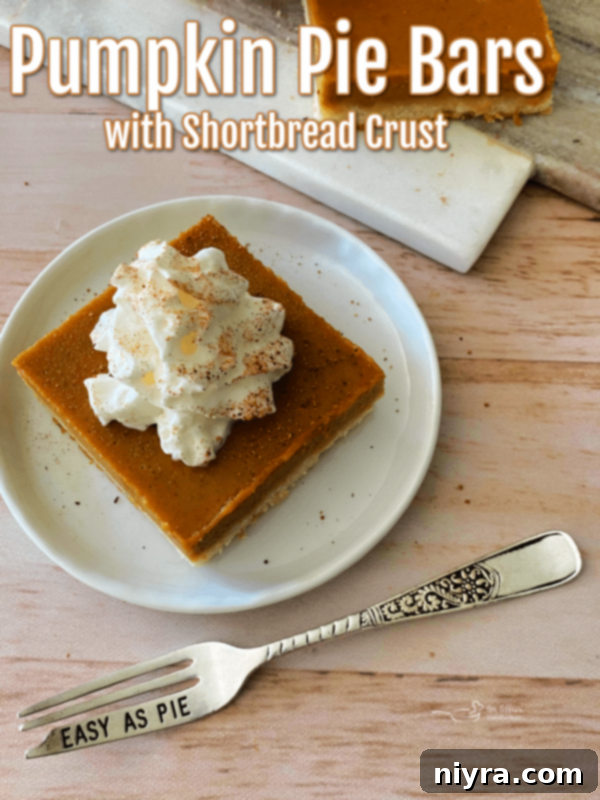 Buttery Shortbread Pumpkin Bars 13 Another beautiful shot of Pumpkin Pie Bars with Shortbread Crust, presented invitingly.