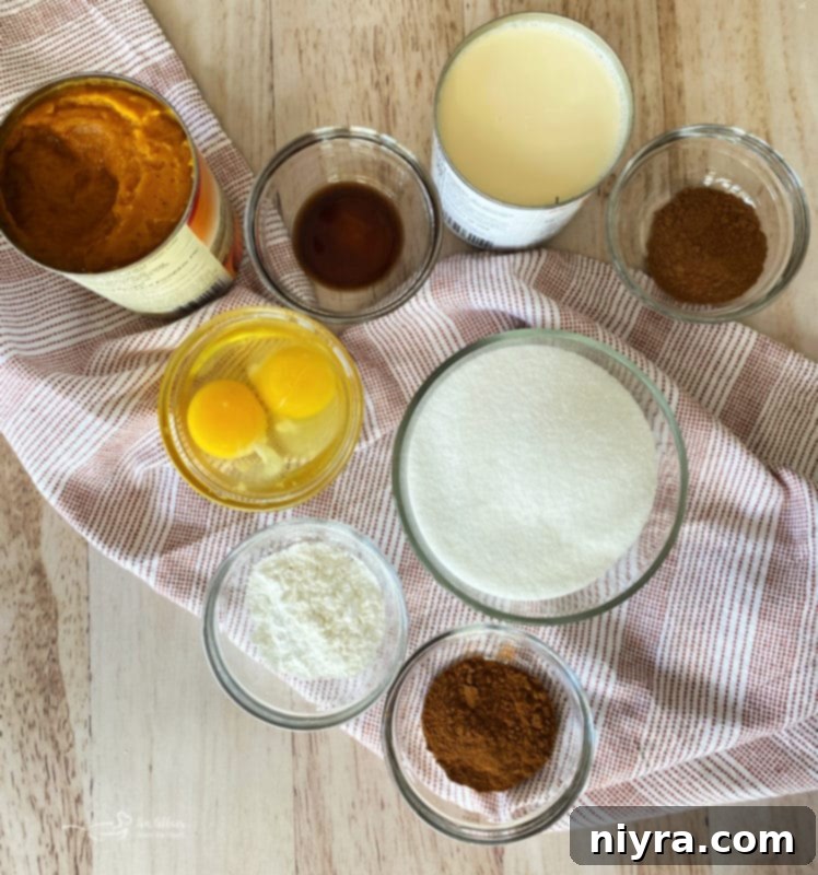 Buttery Shortbread Pumpkin Bars 5 A perfectly cut square of Pumpkin Pie Bar on a white plate, topped with a generous swirl of whipped cream and a sprinkle of cinnamon, showcasing its rich texture and inviting appearance.