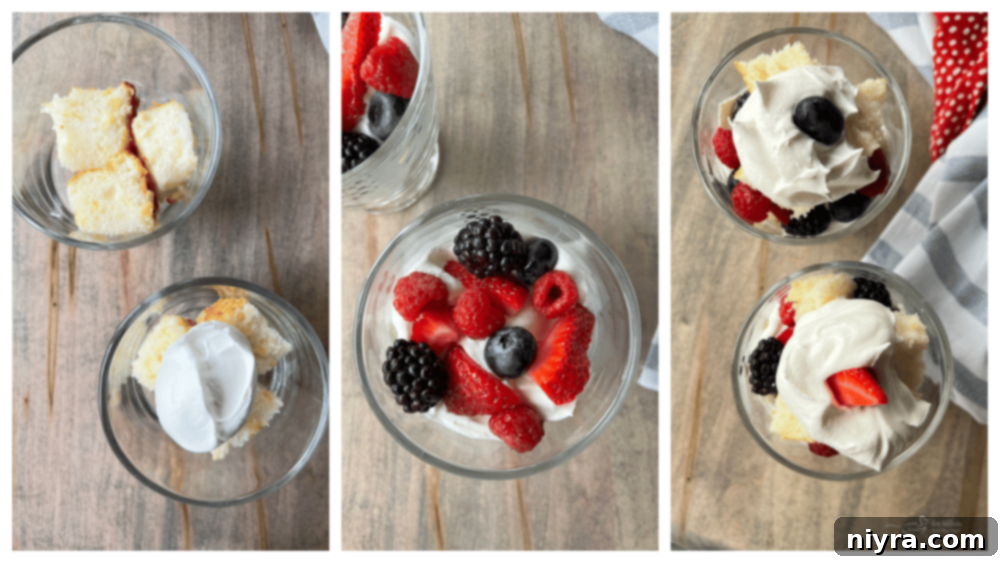 A close-up view of a Berry Trifle in a pedestal glass bowl, highlighting the colorful layers
